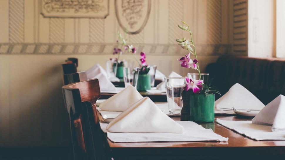 Free Image of Restaurant Table With Napkins and Cutlery 