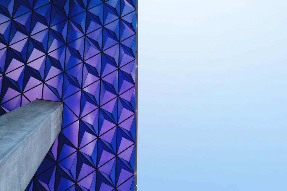 Free Image of Tall Building With Blue Wall 