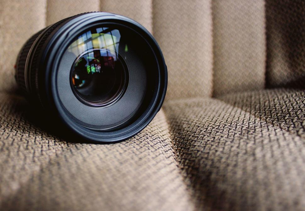Free Image of Camera Lens on Couch 