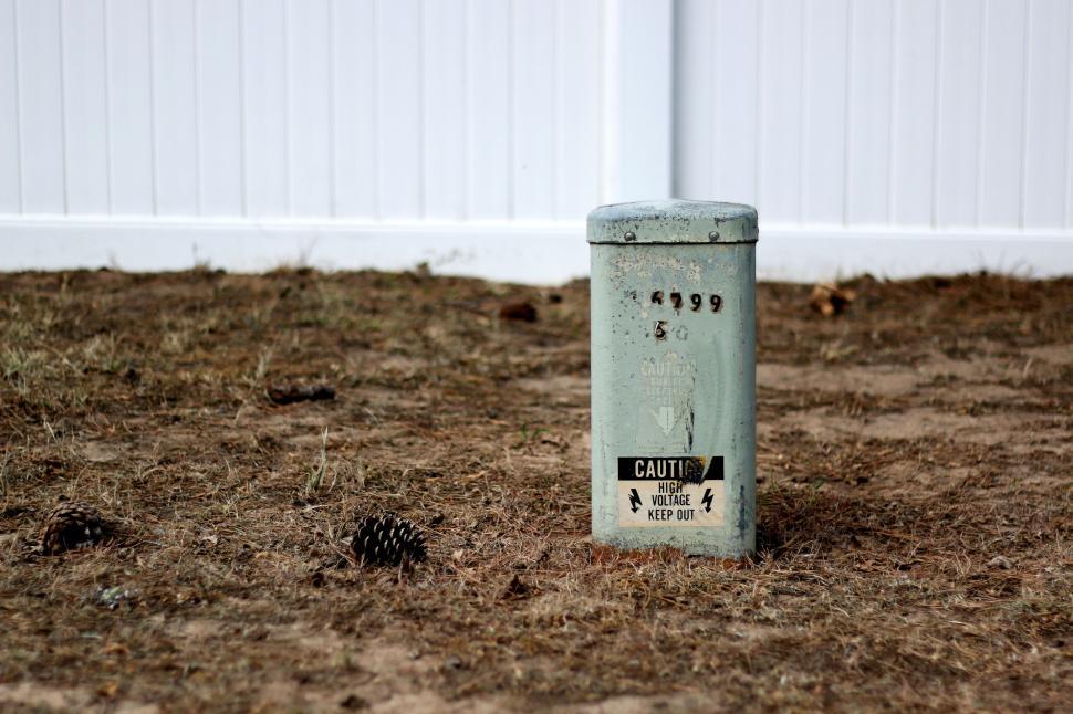 Free Image of Trash Can Abandoned in Field 