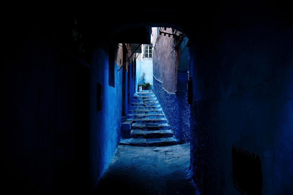 Free Image of Narrow Alleyway With Steps Leading to Building 