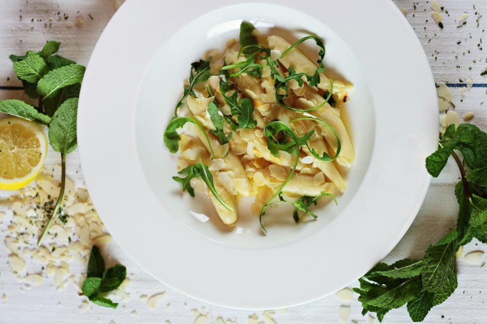 Free Image of White Plate With Pasta and Greens 