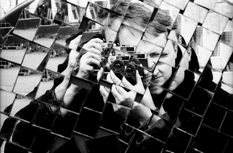 Free Image of Man Taking Selfie in Mirror 