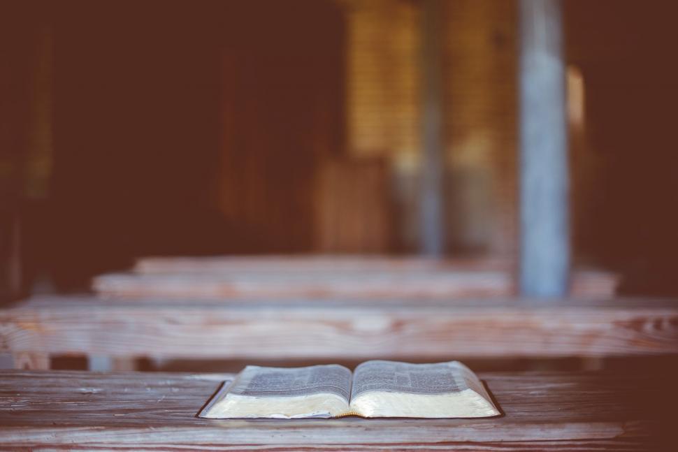 Free Image of Open Book on Wooden Table 