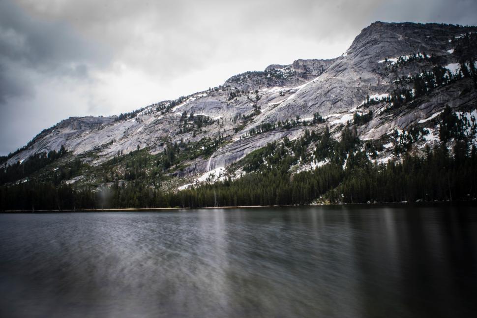 Free Image of Snow-Covered Mountain Next to Lake 