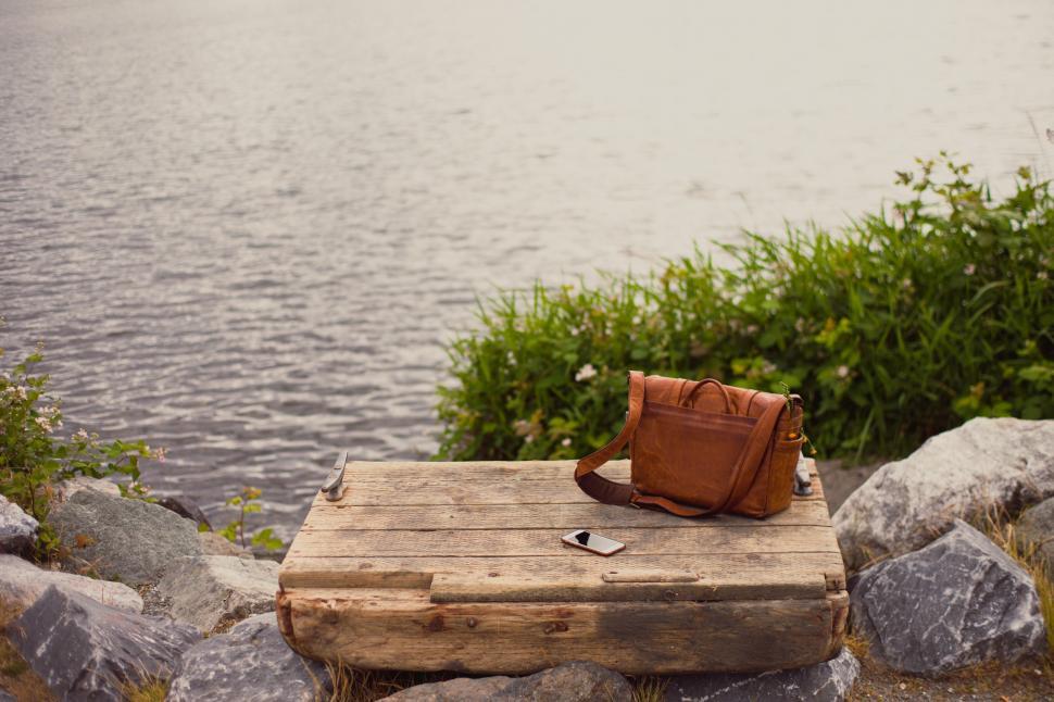 Free Image of Wooden Bench With Bag 