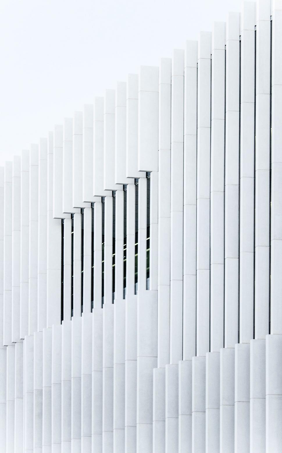 Free Image of White Building With Vertical Lines 