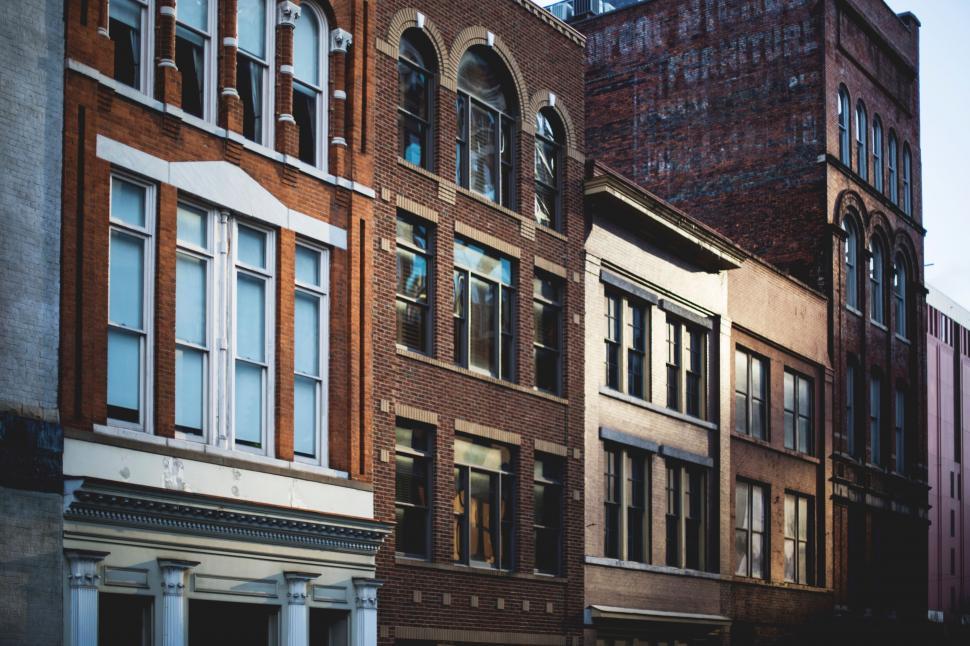 Free Image of Row of Brick Buildings in Urban Area 