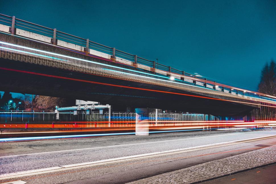 Free Image of Train Crossing Bridge in Long Exposure 