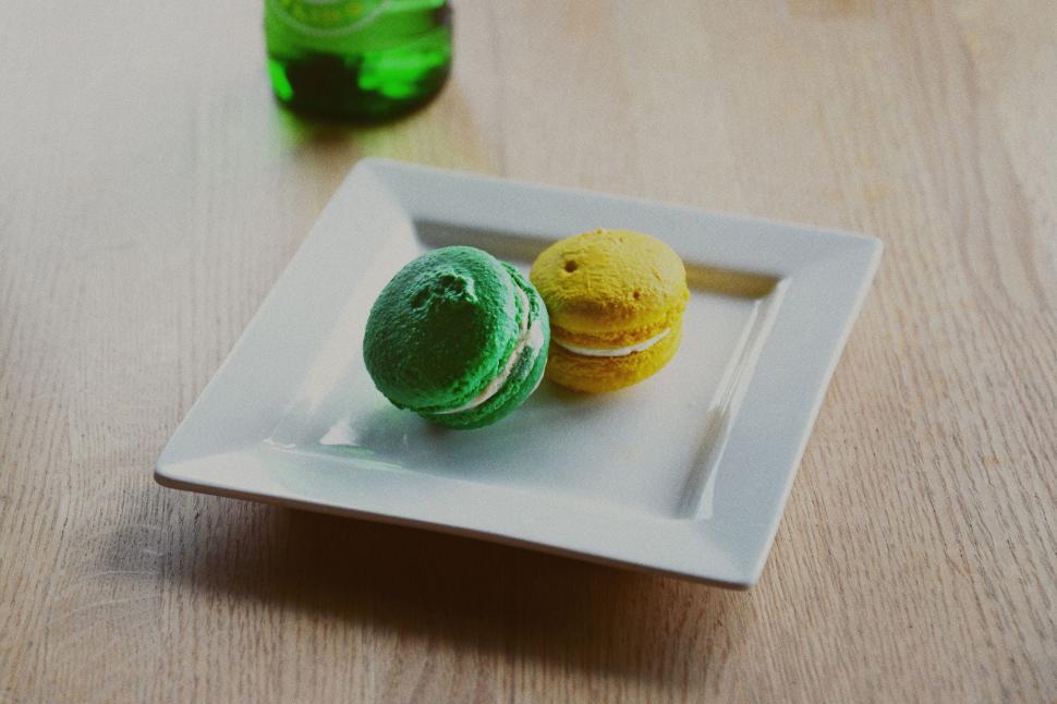 Free Image of White Plate With Green and Yellow Macaroons 