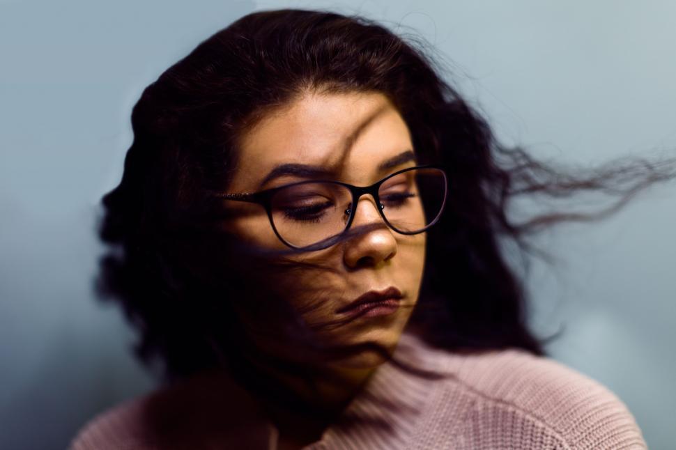 Free Image of Woman Wearing Glasses and Sweater 