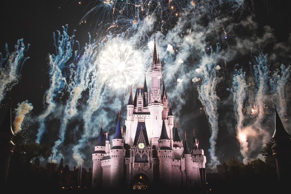 Free Image of Castle Lit up by Fireworks Display 