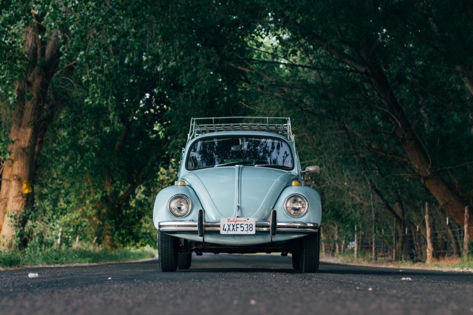 Free Image of Old Car Parked on Side of Road 