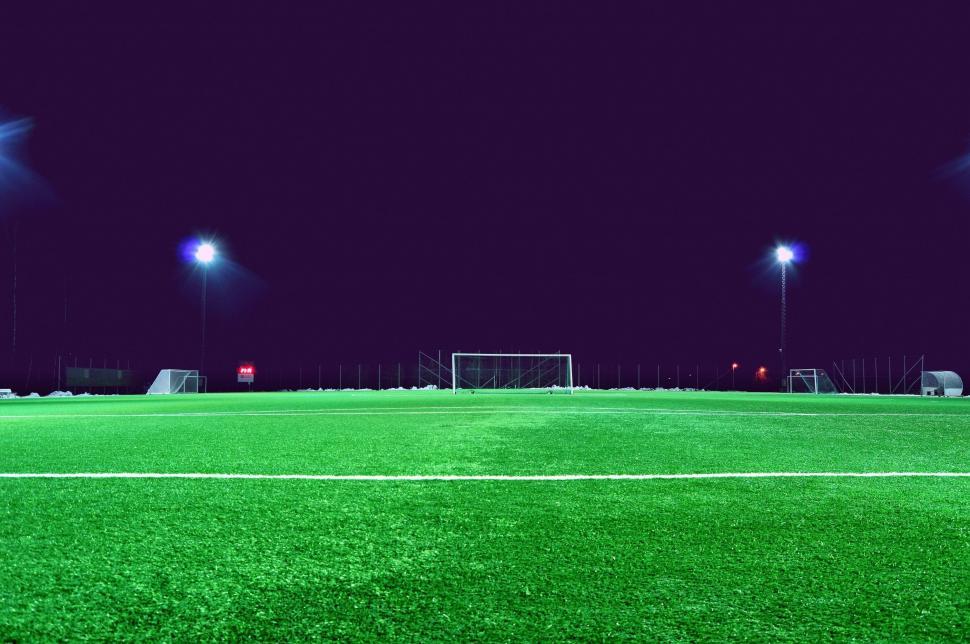 Free Image of Soccer Field Illuminated at Night 
