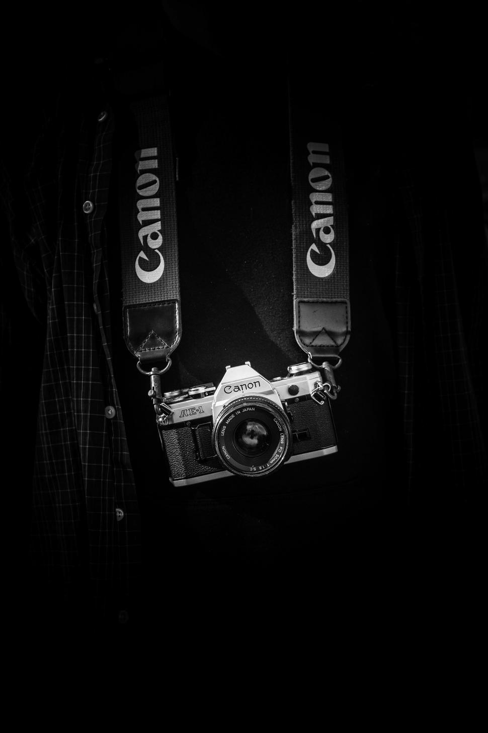 Free Image of Person Holding A Camera In The Dark 