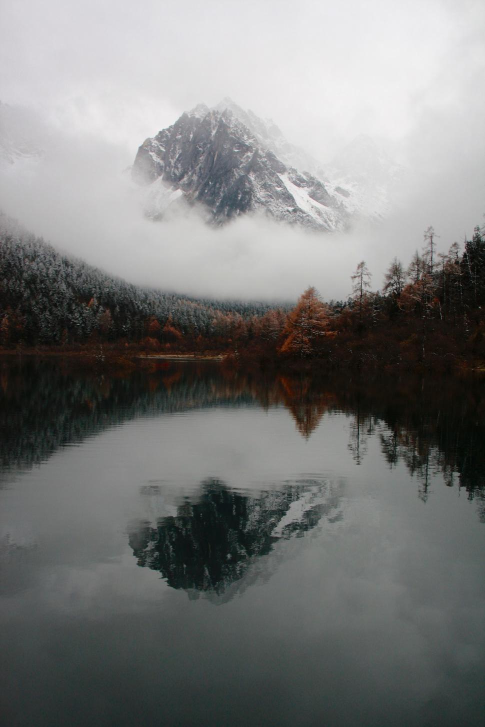 Free Image of Snow-Covered Mountain by Lake 
