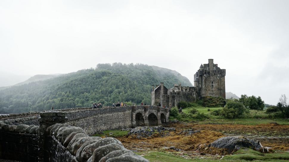 Free Image of Castle on Hill With Bridge 