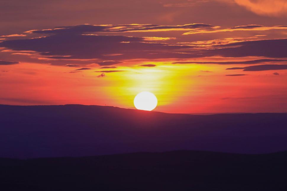 Free Image of Sun Sets Over Mountain Range 