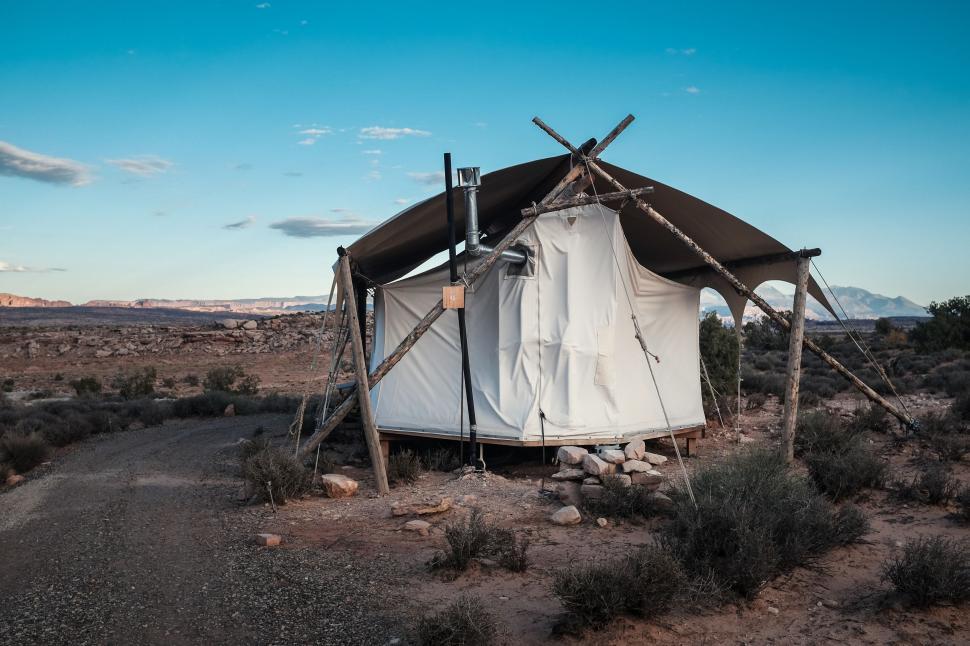Free Image of White Tent Standing in Desert 