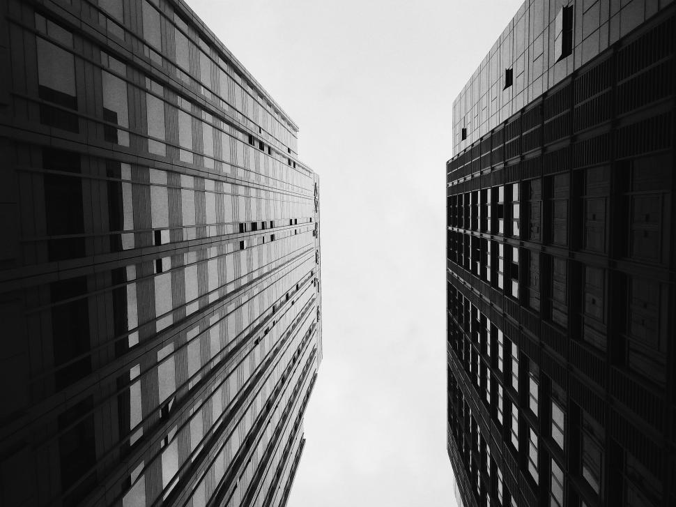 Free Image of Two Tall Buildings in Black and White 