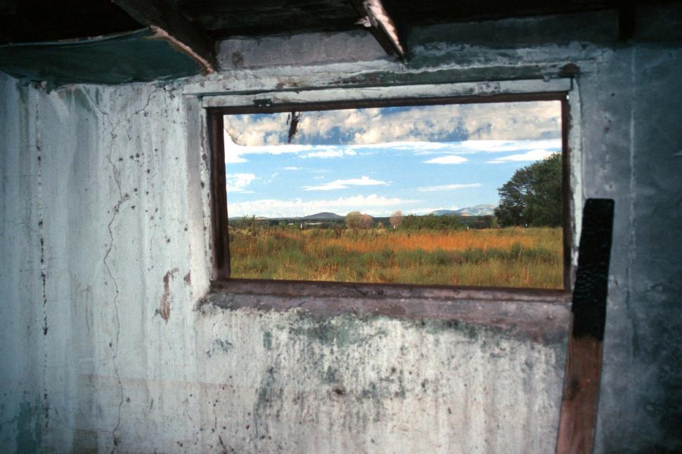 Free Image of windows shack ruin broken view meadow field grass walls frames framed outside rotten dilapidated building 