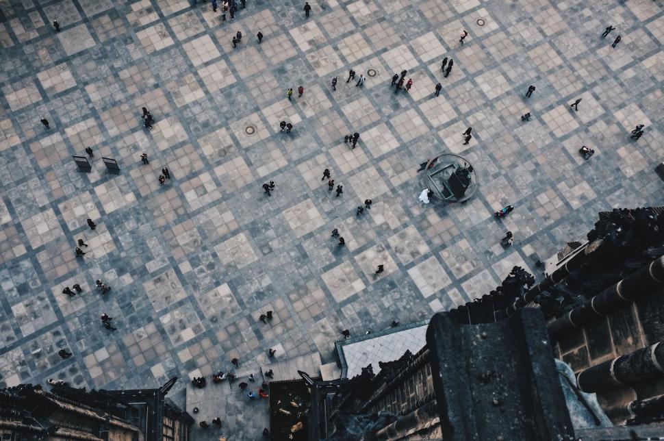 Free Image of Overhead View of a Busy Urban Street With Pedestrians Walking 