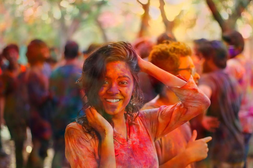 Free Image of Group of People Covered in Colored Powder 