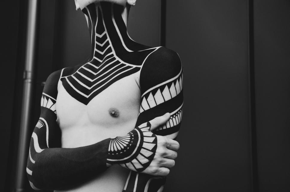 Free Image of Man Wearing Mask and Body Paint 