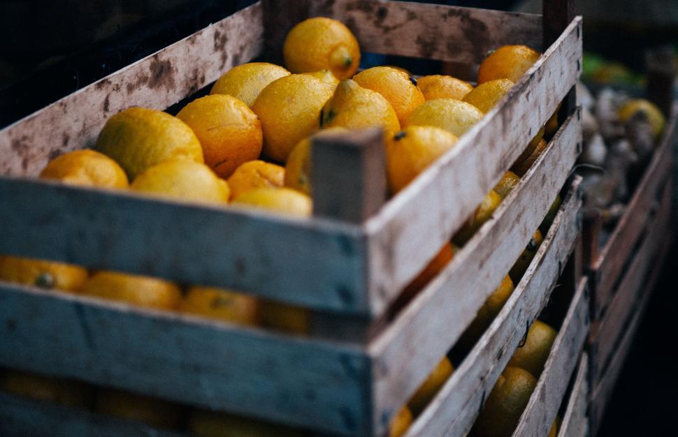 Free Image of Crate Filled With Yellow Lemons 