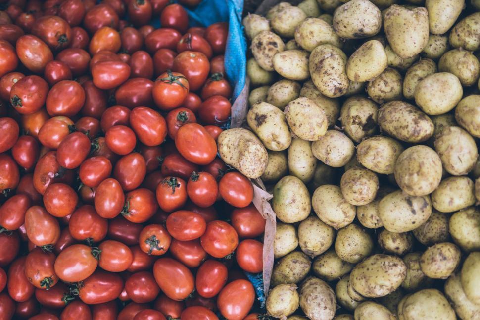 Free Image of Display of Potatoes and Tomatoes 