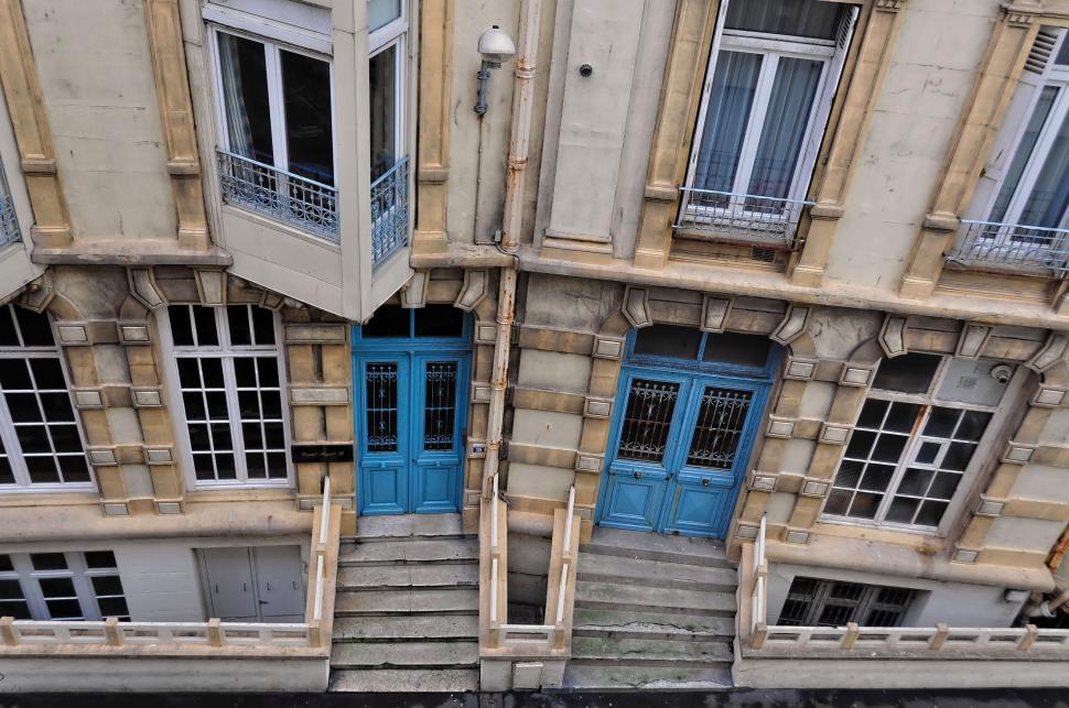 Free Image of Building With Blue Doors 