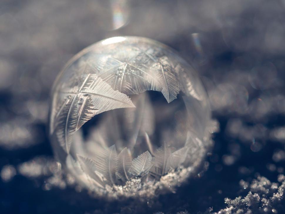 Free Image of Glass Ball Covered in Snow 