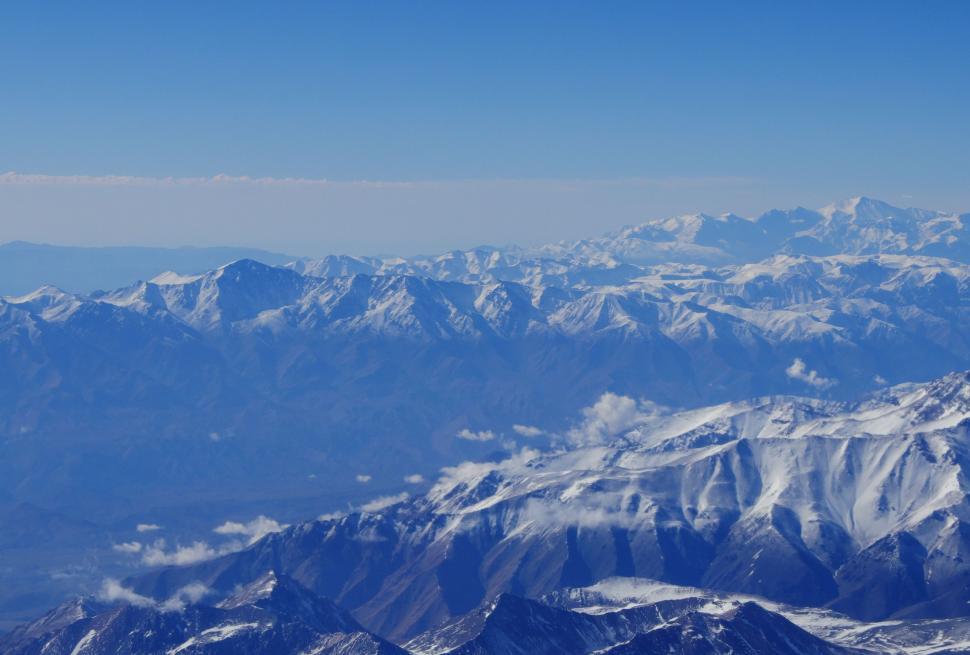 Free Image of Snow-Covered Mountains View From Airplane 