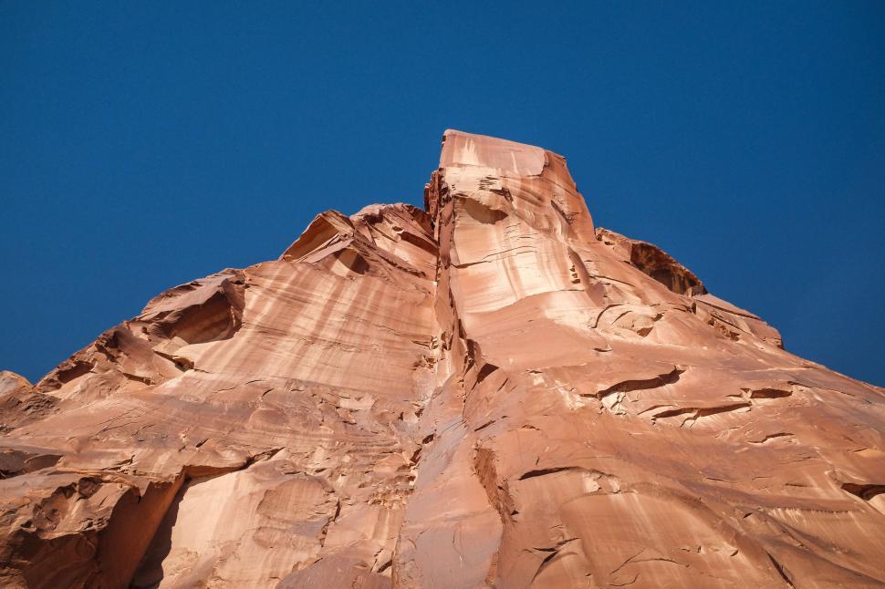 Free Image of Majestic Rock Formation Against Blue Sky 