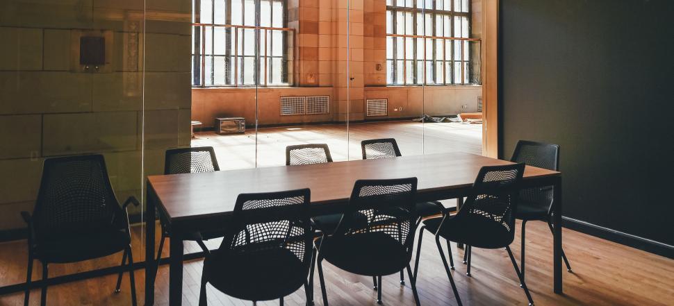 Free Image of Conference Room With Long Table and Chairs 