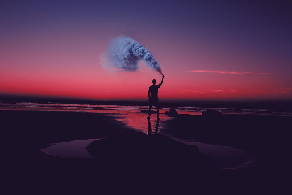 Free Image of Person Standing on Beach, Cloud in Sky 