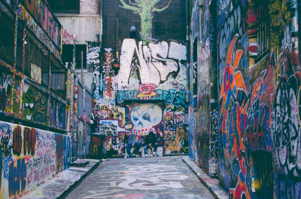 Free Image of Narrow Alley Covered in Graffiti 