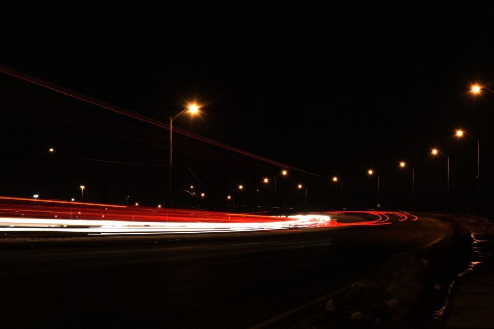 Free Image of Dynamic Nighttime Traffic on Urban Street 
