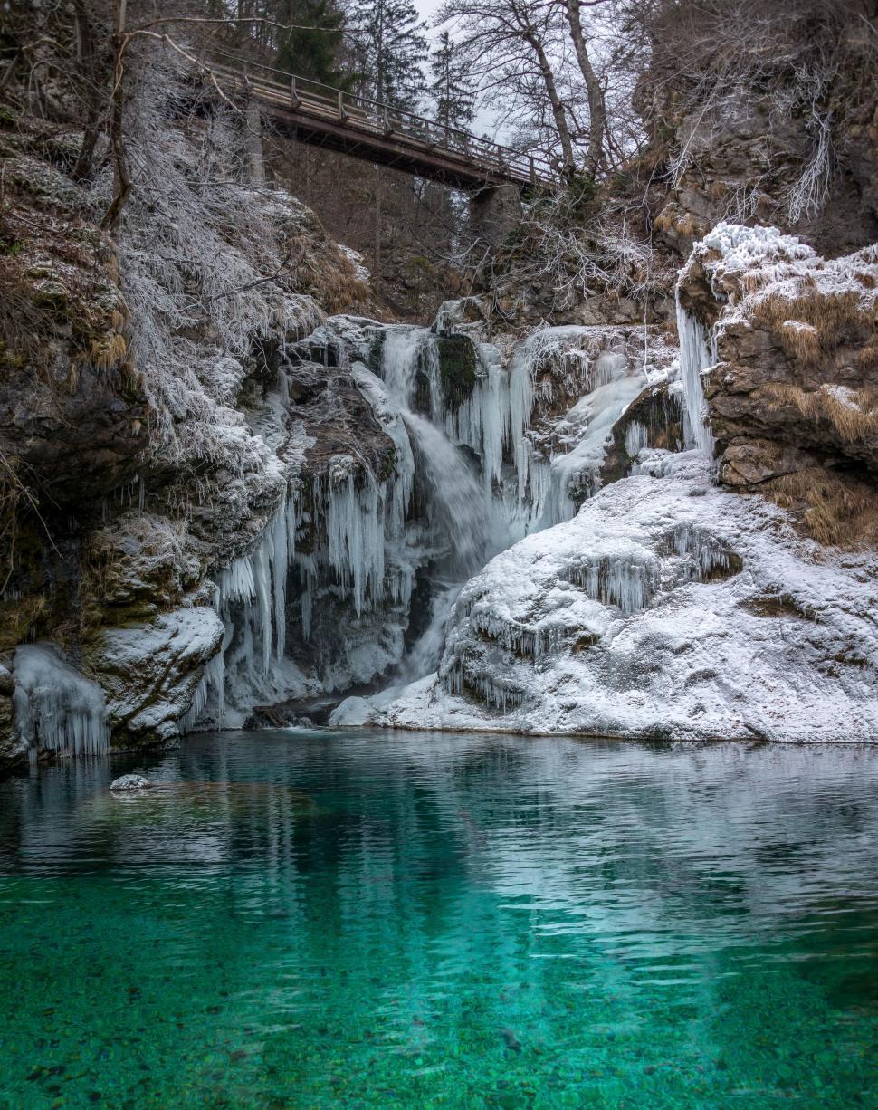 Free Image of Frozen Waterfall With Bridge 