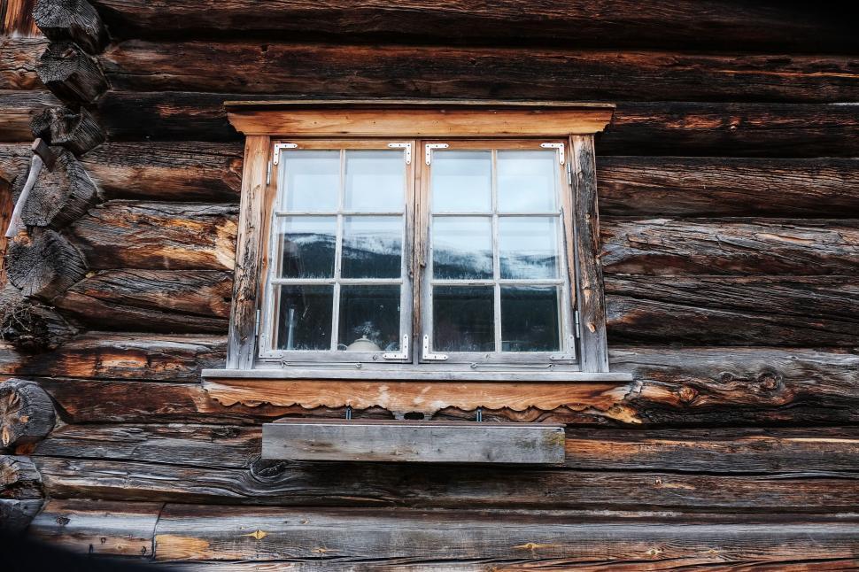 Free Image of Log Cabin With Window and Window Sill 