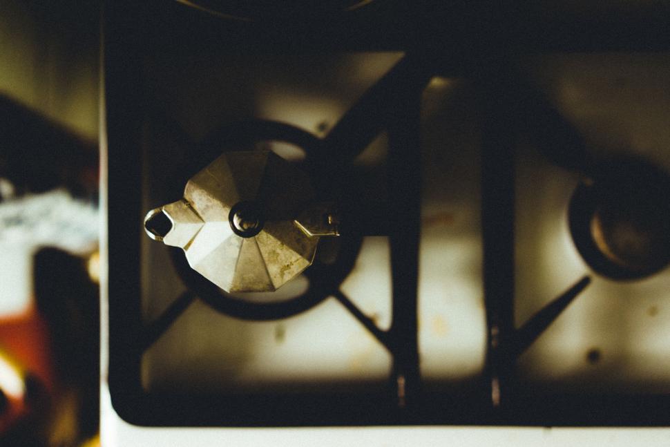 Free Image of Stove Top With Bottle of Wine 