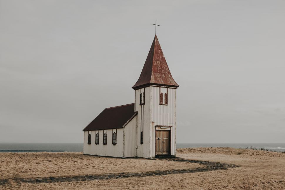 Free Image of Small Church on Sandy Beach 