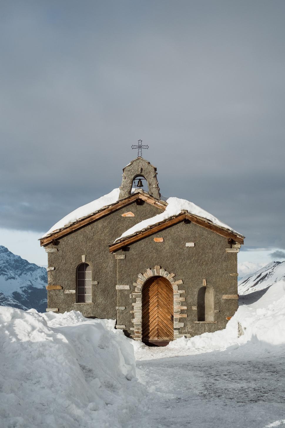 Free Image of Small Church in Snowy Field 
