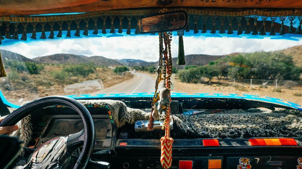 Free Image of View From Inside a Vehicle of a Dirt Road 