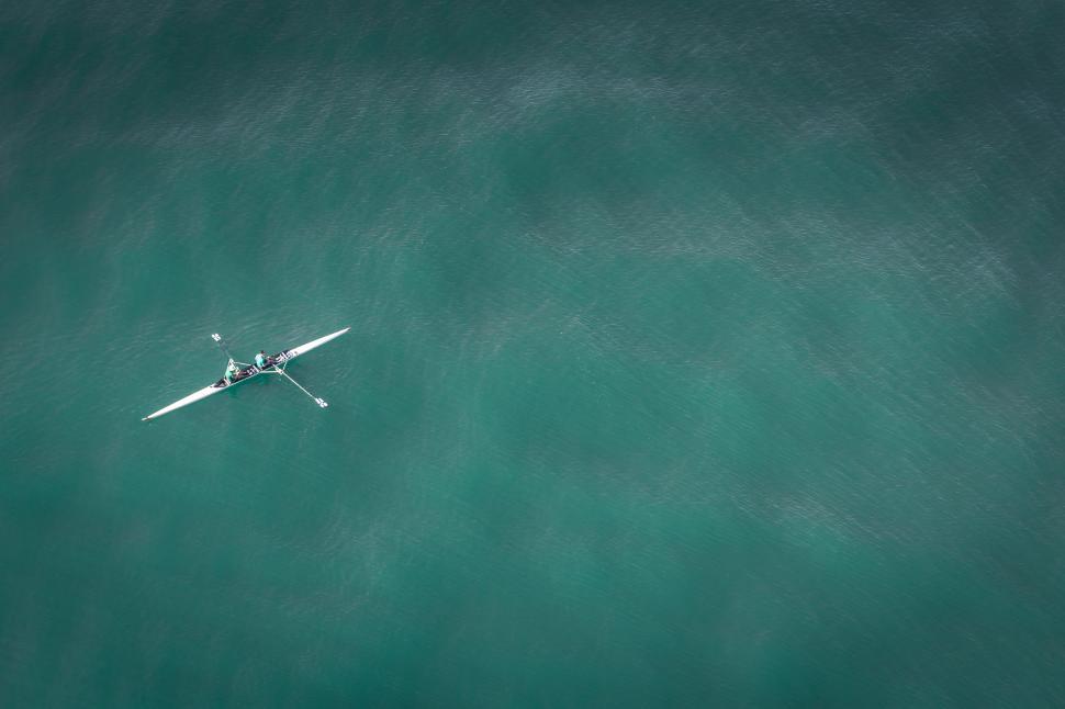 Free Image of Plane Flying Over Body of Water 