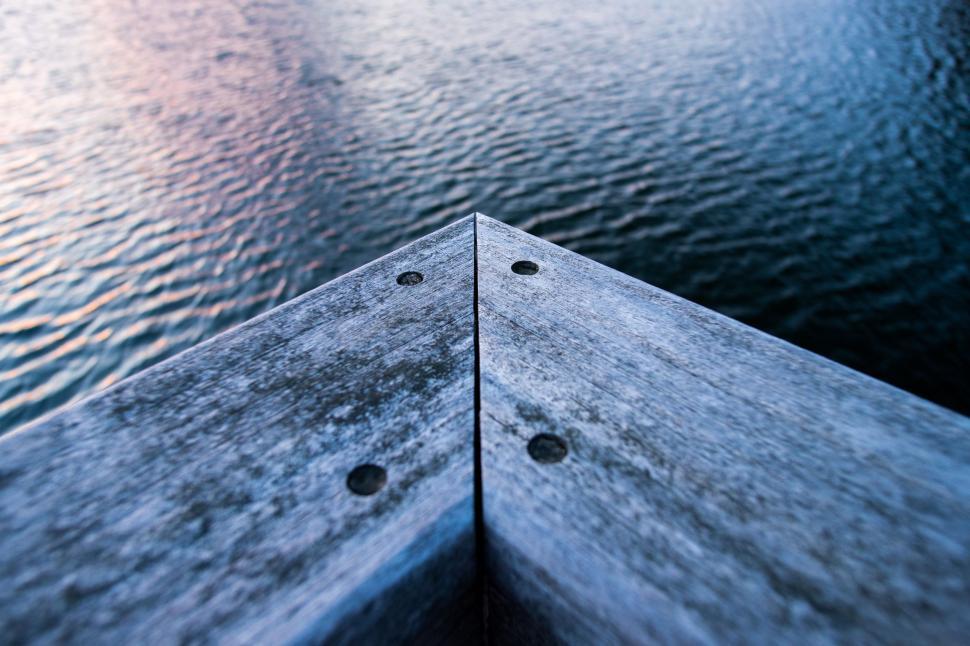 Free Image of Close Up of a Wooden Post in the Water 