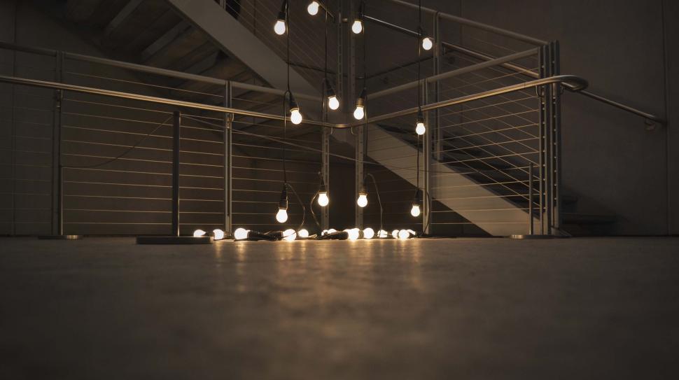 Free Image of Array of Hanging Lights Illuminating a Room 