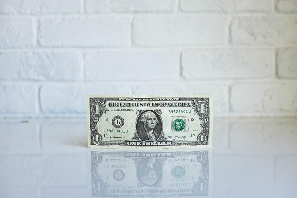 Free Image of One Dollar Bill on Table 