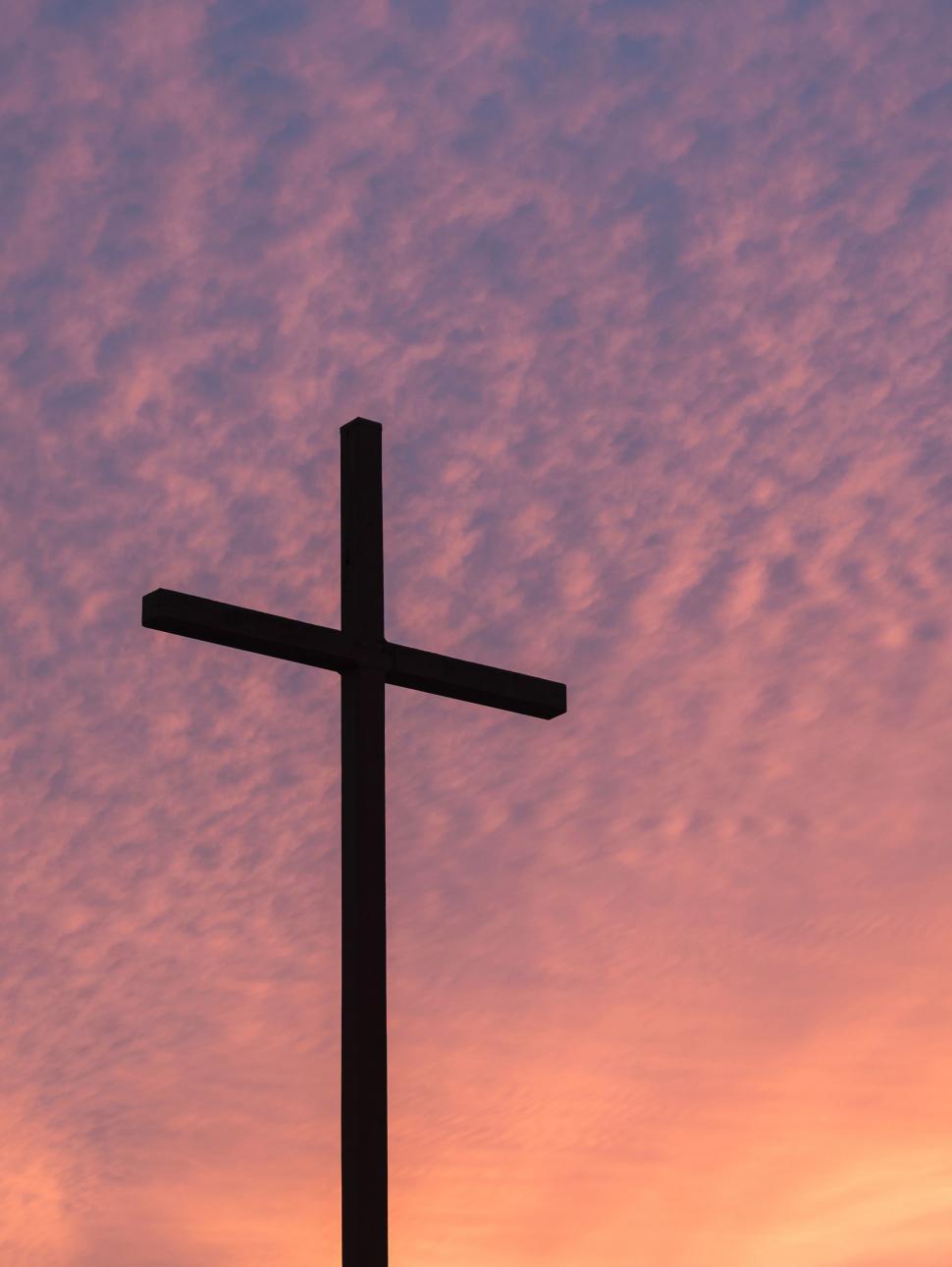 Free Image of Cross on Top of a Hill at Sunset 