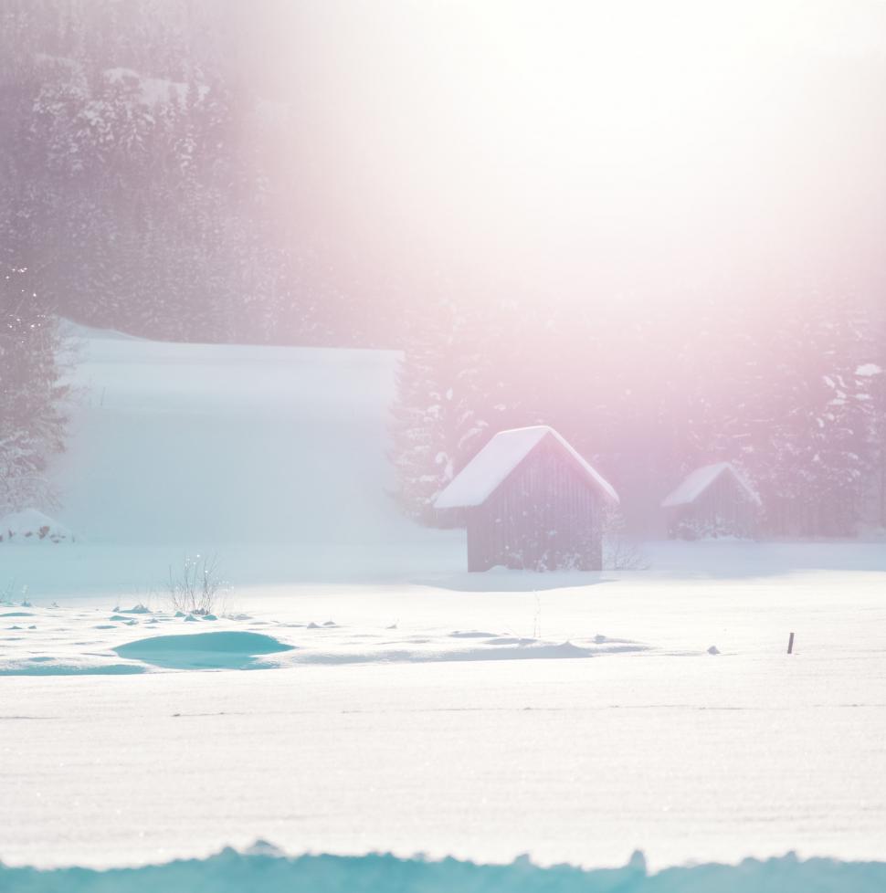 Free Image of Snow Covered Field With Distant House 